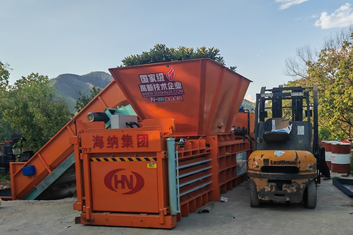 100噸小臥提升門臥式打包機(jī)